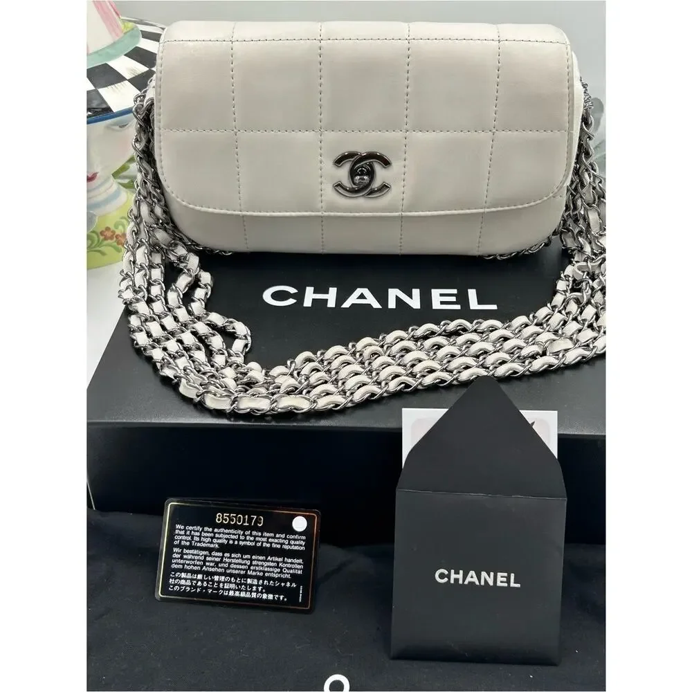 Women's vintage Chanel multi chain quilted flap bag made in Italy PRISTINE
